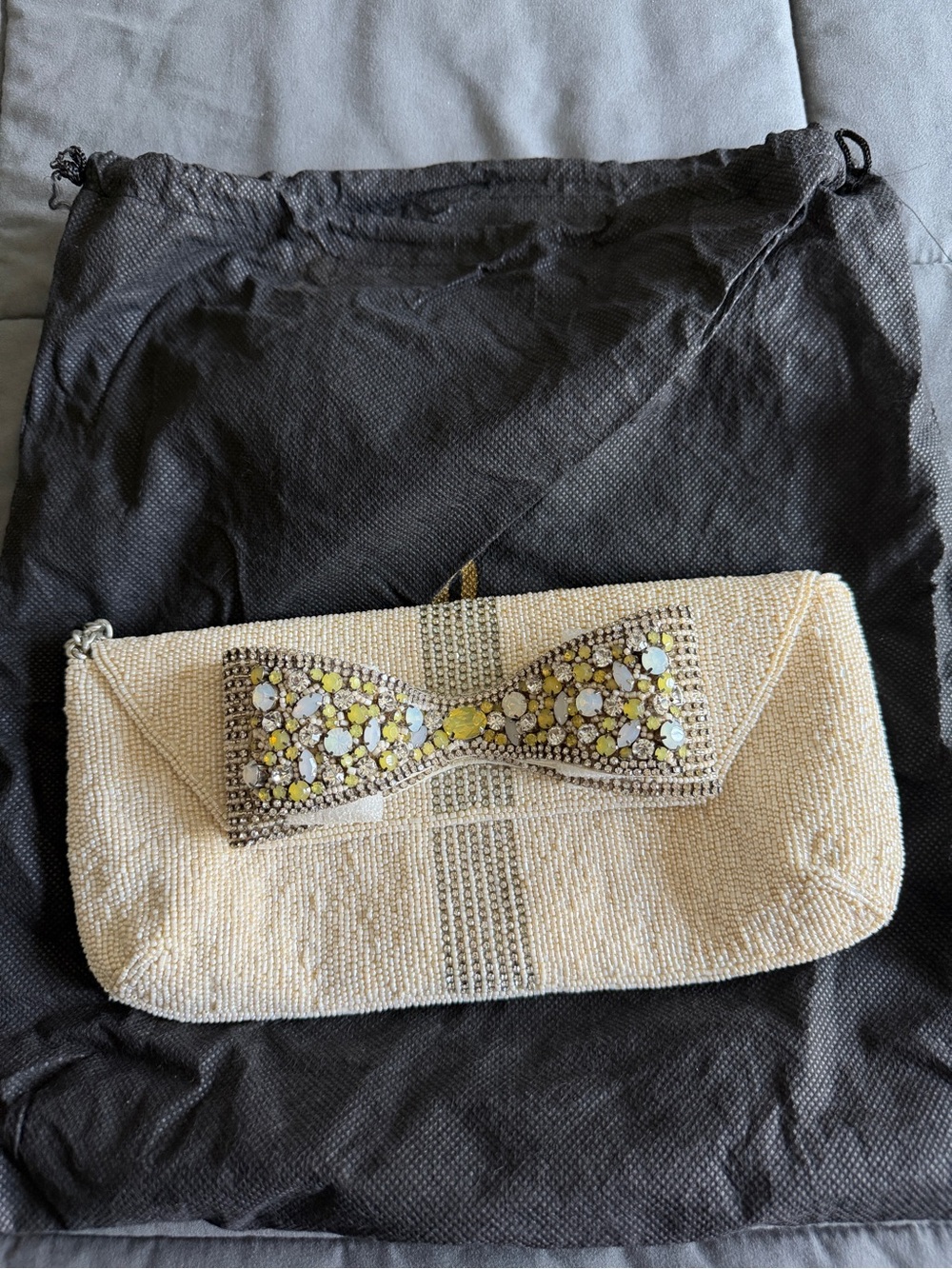 Mary Frances Cream Beaded Clutch with Yellow and Silver Bow Accent